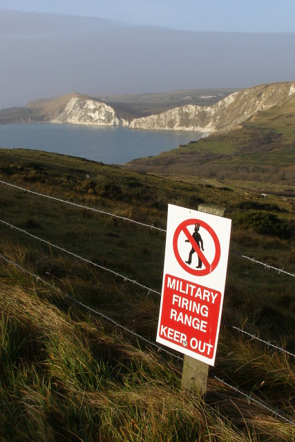 Red flags are flown, and red flashing lights are displayed from the flag-staffs on Bindon Hill, Kimmeridge Bay and St. Albans Head ONLY WHEN ARMY FIRING IS TAKING PLACE. However, further ashore, some red flags which fly whether or not firing is taking place, these mark the range boundary.